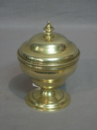 A George III silver gilt cup and cover, the lid with armorial decoration, raised on a spreading foot, London 1795, 7 ozs