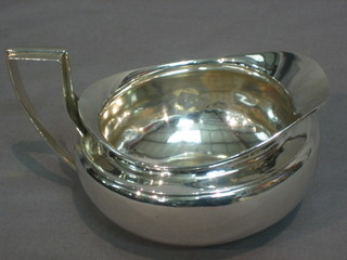 A Victorian silver cream jug, London 1881, 6 ozs