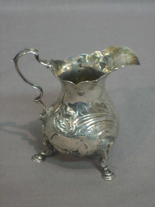 A Georgian silver cream jug (heavily repaired) 2 ozs