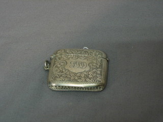 A silver vesta case with engraved decoration Birmingham 1912