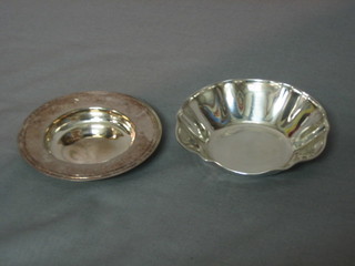 A modern circular silver Armada dish 3" and a Continental dish 3"