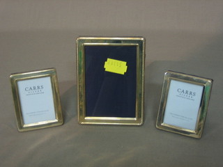 3 modern silver easel photograph frames 4" x 3" and 2 1/2" x 2"
