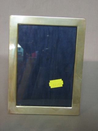 A modern silver easel photograph frame 7" x 5"