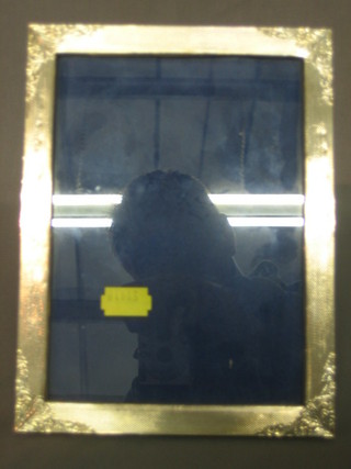 A modern silver easel photograph frame
