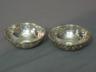 A pair of circular pierced silver bon bon dishes, Sheffield 1935, 2"
