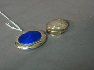 An oval silver and blue enamel compact 2" Birmingham 1917, together with a modern oval silver pill box with engraved decoration