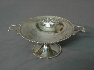A circular pierced silver twin handled bowl London 1930 by Mappin & Webb 2 ozs