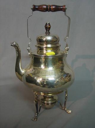A Continental white metal spirit kettle on stand with wooden handle, the base marked 800, 34 ozs