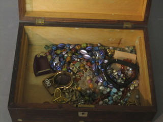 A Victorian rosewood box containing a collection of costume jewellery