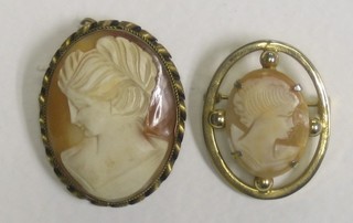 2 shell carved cameo brooches