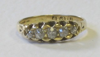 An 18ct gold 5 stone diamond ring