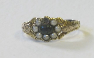 A gold mourning ring set demi-pearls (1 missing)