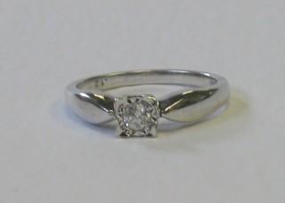 A lady's 18ct white gold engagement/dress ring set a solitaire diamond