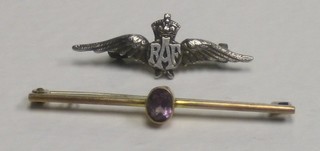 A gold bar brooch set an amethyst together with a silver RAF sweetheart brooch 