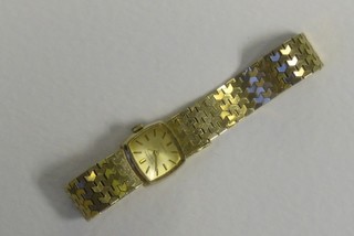 A lady's Rodina wristwatch contained in a 9ct gold case with integral bracelet