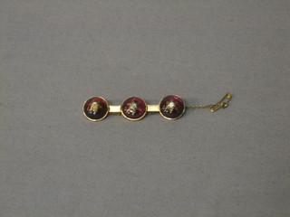 A Victorian gilt metal brooch set 3 circular cabouchon stones set 3 diamonds