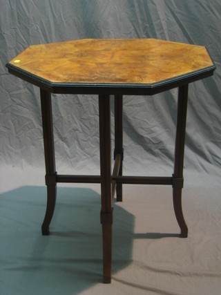 A Victorian walnut octagonal occasional table, raised on turned supports with X framed stretcher 25"