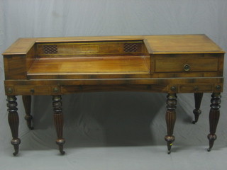 A William IV square mahogany piano/spinet case converted for use a desk, fitted a stationery box and 4 drawers, raised on turned and reeded supports 66"