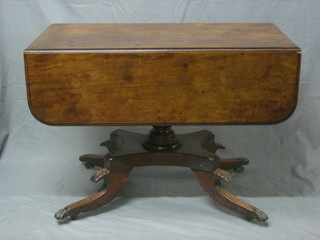 A William IV mahogany pedestal Pembroke table fitted a frieze drawer, raised on a turned column with triform base and splayed feet 38"