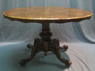 A Victorian oval figured walnut Loo table raised on pillar and tripod supports 48" (no bolts)