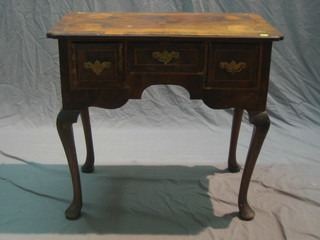 An 18th Century walnut low boy with crossbanded top and satinwood stringing, fitted 1 long drawer flanked by 2 short drawers, raised on cabriole supports 30"