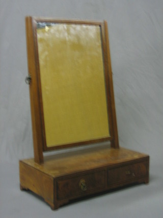 A 19th Century rectangular plate dressing table mirror contained in a mahogany swing frame, the base fitted 2 drawers and raised on bracket feet 16"