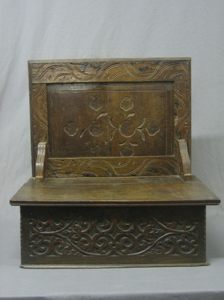 An 18th/19th Century carved oak bible box with raised back 25"