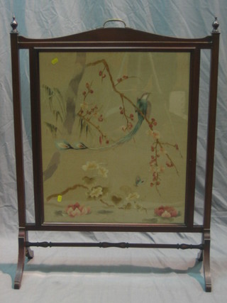 An Edwardian walnut fire screen with embroidered panel to the centre 29"