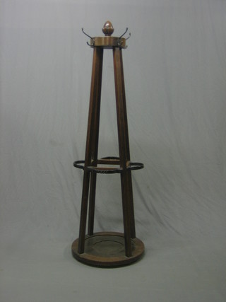 An Art Nouveau oak umbrella stand
