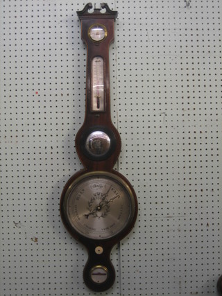 An 18th/19th Century mercury wheel barometer and thermometer with damp/dry indicator, mirror and spirit level, contained in an inlaid mahogany wheel case