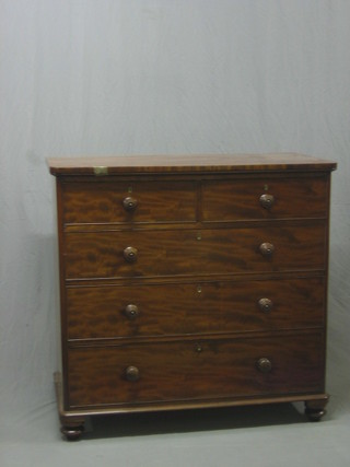 A Victorian mahogany D shaped chest of 2 short and 3 long drawers, raised on bun feet 43"