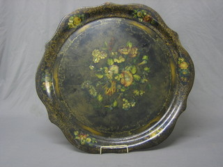 A Victorian papier mache circular tray with floral decoration 24"