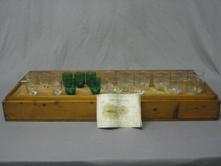A fascinating and unusual Aquadigipsycharmonica comprising 20 glasses, contained in a wooden case with instructions "Invented and manufactured only by the Watford Family" 