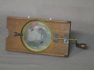 A 19th Century automatic coloured magic lantern slide - Sleeping Gentleman with Mouse, with handle to the side by Carpenter & Westley of 24 Regent Street London