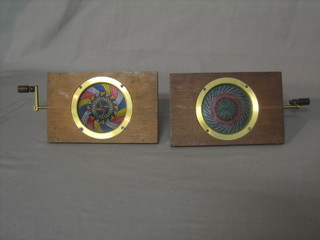 2 kaleidoscope coloured magic lantern slides with handle to the side