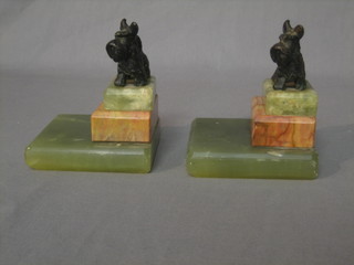 A pair of 1930's Art Deco onyx and bronze book ends in the form of standing Scottie Dogs