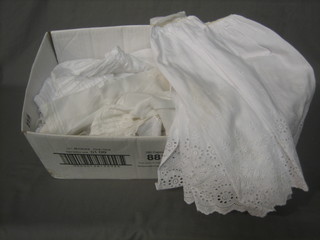 A small quantity of various dolls clothing and christening dresses 