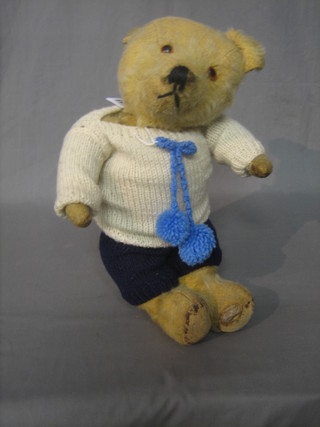 A yellow teddybear with squeak