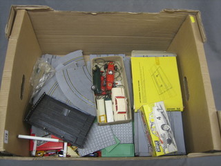 A quantity of Scalextrix track and an Airfix racing car etc