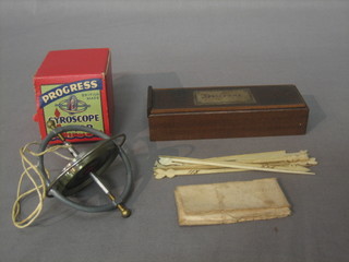 A Gyroscope and a set of ivory Spelicans