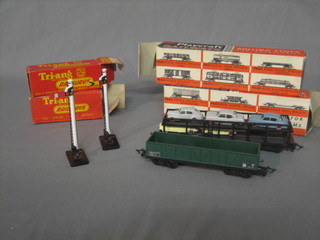 A Triang 2-R 43H hand operated signal together with 1 other and 2 Playcraft items of rolling stock
