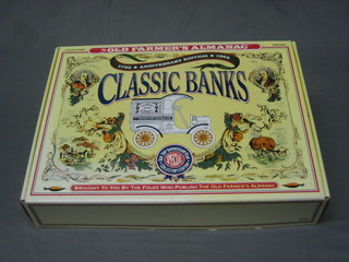A box set of The Old Farmers Almanac Classic Banks farm delivery vehicle set