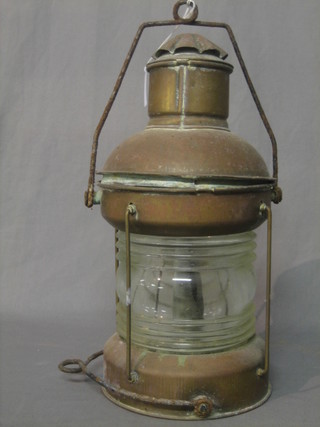 A copper ships lantern marked HML 1-619 Husaini Electric Works