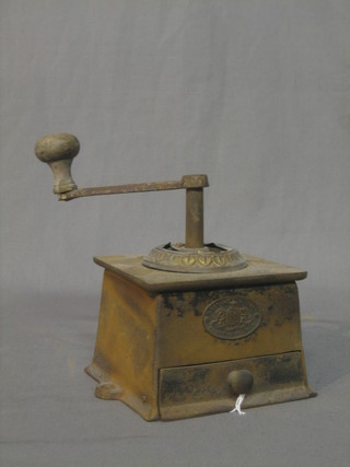 A Victorian cast iron coffee grinder
