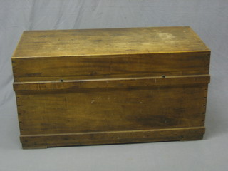 A camphor wood coffer with hinged lid and iron drop handles 42"