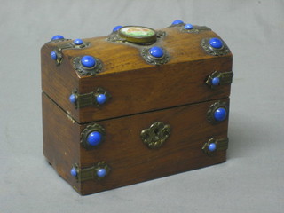 A handsome Victorian rosewood dome shaped twin compartment scent bottle box set with cabouchon blue stones and having an oval panel decorated a seated girl to the centre 5 1/2"