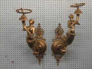 An impressive pair of gilt metal lamp brackets in the form of classical ladies, marked E Harbedienne