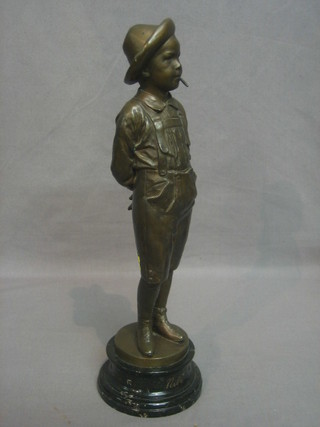 C Kundomann, a bronze figure of a standing boy smoking a cheroot, raised on a black marble base 13"