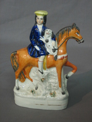 A Staffordshire figure of a horseman with dog 7"