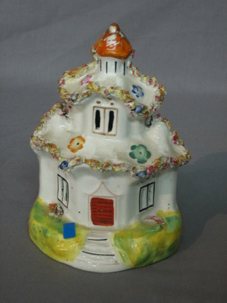 A Staffordshire figure of a cottage 6"